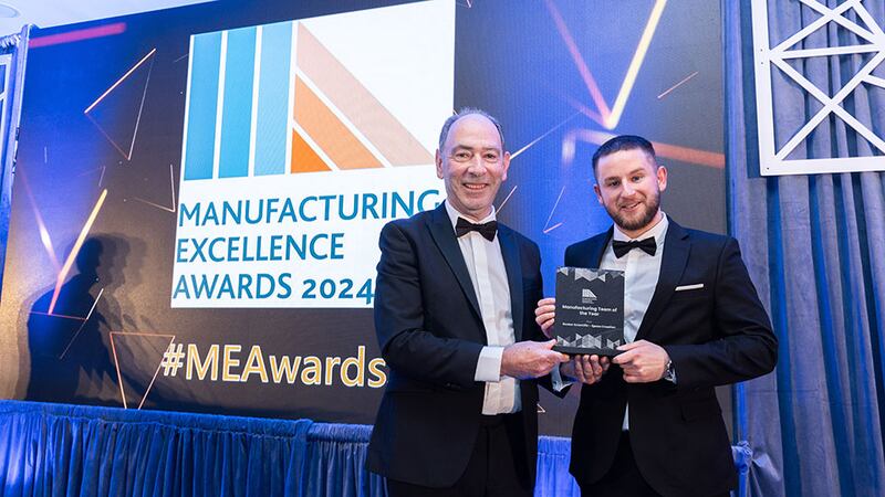 Denis Dowling, full professor, School of Mechanical and Materials Engineering, University College of Dublin presents the manufacturing team of the year award to Adam Kane, community lead at Business River on behalf of Boston Scientific