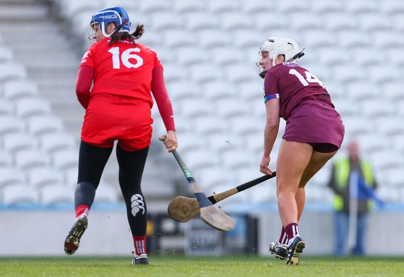 
Galway's Ailish O'Reilly scores past Cork’s Molly Lynch during the league clash at Páirc Uí Chaoimh. Photograph: Ken Sutton/Inpho 