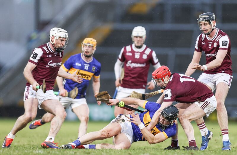 Tipperary's Gearoid O'Connor is challenged by Galway's Tom Monaghan during the Division 1 game at Pearse Stadium. Photograph: Tom Maher/Inpho