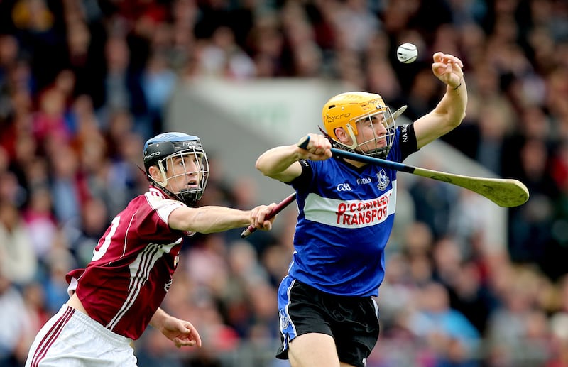 Bishopstown's Ronan Conway (left) and Eanna Martin of Sarsfields in action in the Cork SHC final in 2012. Photograph: James Crombie/Inpho
