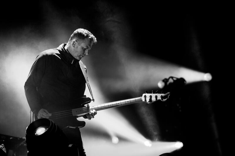 Tom Chapman of New Order performs on stage at 3Arena, Dublin. Photograph: Tom Honan