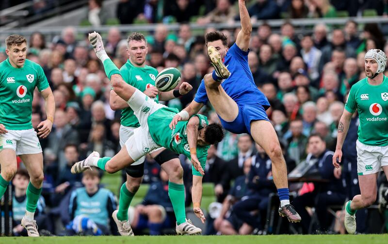 France’s Ethan Dumortier with Conor Murray of Ireland. Photograph: Billy Stickland/Inpho