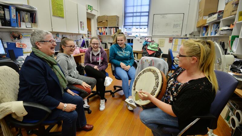 Participants in the Talk about Youth Project with project manager Carmel O’Connor, left,  and Nina Buckley,  right, youth worker, at Andrew’s Resource Centre on Pearse Street. Photograph: Alan Betson / The Irish Times