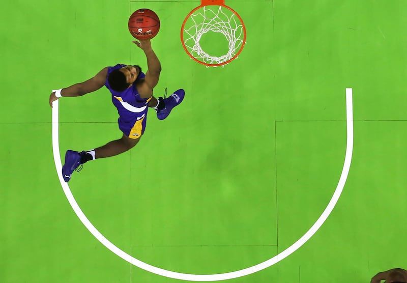 Ahmed Clarke of University at Albany scores against Long Island University during Thursdays game of the Basketball Hall of Fame Belfast Classic, Belfast.