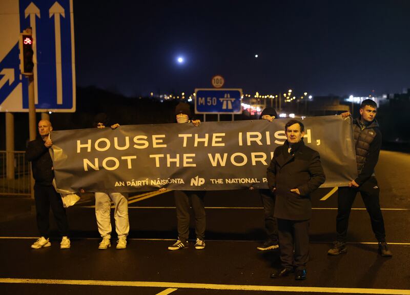 National Party leader Justin Barrett (front right) at an anti-refugee protest at the M50 exit to Ballymun on January 12th. Photograph: Dara Mac Dónaill/The Irish Times