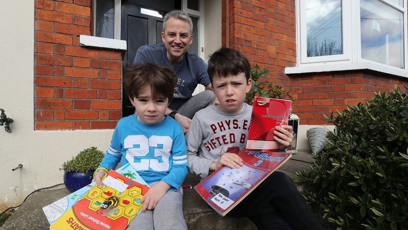 Edward Gray with sons Tom (9) and Charlie (5). Photograph: Nick Bradshaw