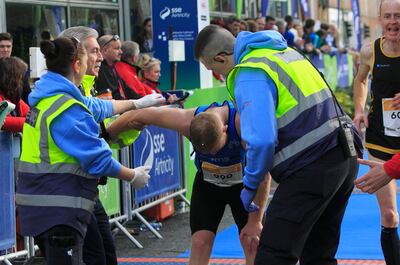 Runners on the finish line during the SSE Airtricity Marathon in Dublin's city centre.
Photograph: Gareth Chaney Collins