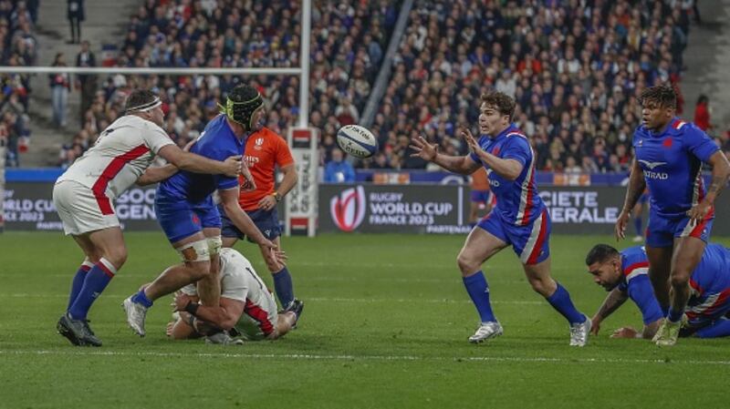 Gregory Alldritt’s offload set up Antoine Dupont for the match-securing score against France. Photograph:  Loic Baratoux/Anadolu Agency via Getty Images