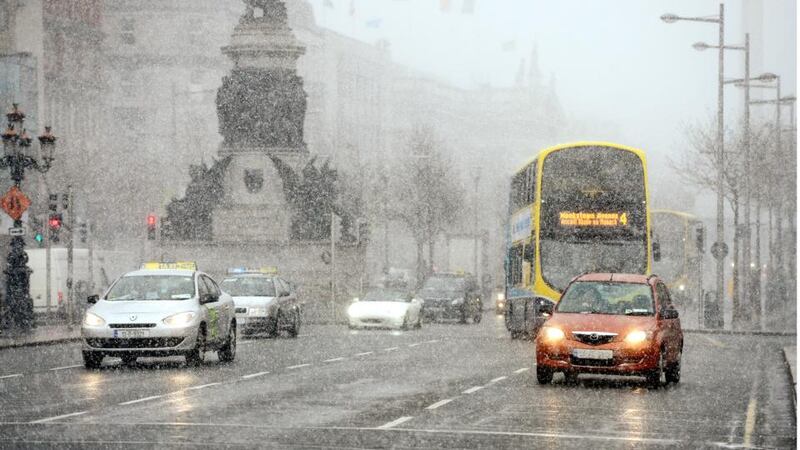 Snow and sleet and very cold conditions in Dublin City Centre. Photograph: Bryan O'Brien / THE IRISH TIMES