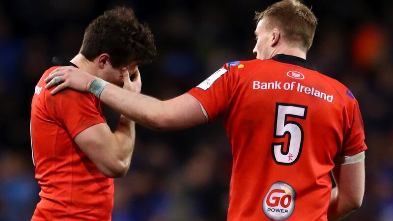 Kieran Treadwell consoles his Ulster  team-mate Jacob Stockdale after the Heineken Champions Cup quarter final defeat to Leinster  at  the Aviva stadium. Photograph:  Michael Steele/Getty Images