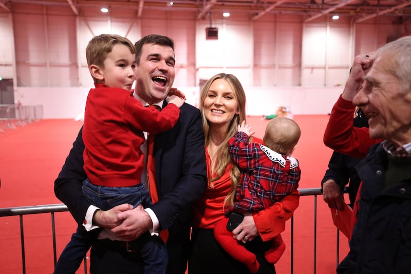 Labour's Duncan Smith celebrates with his wife Lynsey and children George 5 and baby Rose after beingelected in Fingal East. Photograph: Dara Mac Dónaill / The Irish Times







