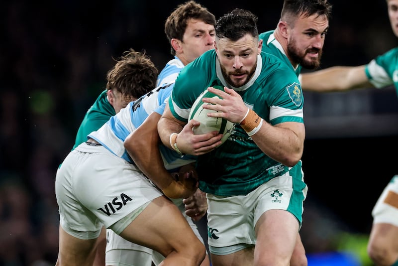 Ireland's Robbie Henshaw is tackled by Argentina's Julián Montoya. Photograph: Billy Stickland/Inpho