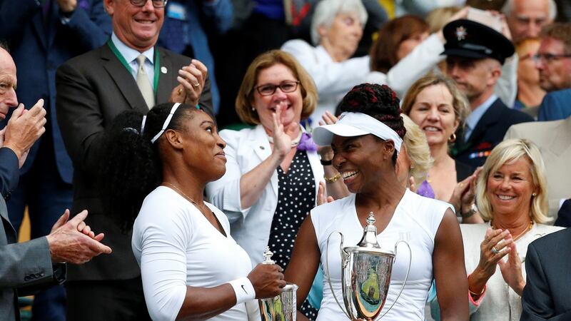 Serena and Venus Williams celebrate their women’s doubles victory at Wimbledon in 2016. Photograph: Lindsey Parnaby/Getty