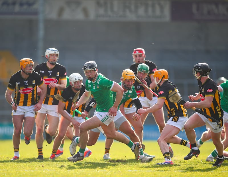 Kilkenny and Limerick players at close quarters during the game. Photograph: Ken Sutton/Inpho                                         