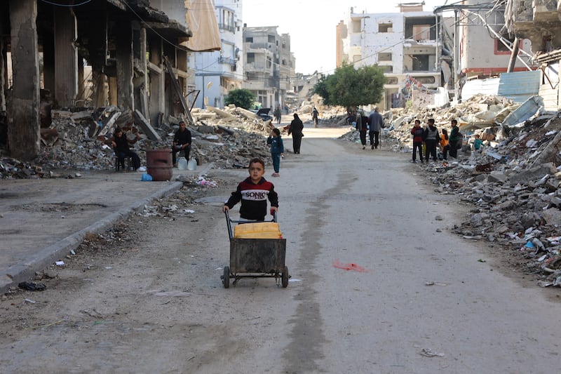 A Palestinian boy transports water back to his family in Jabalia in the northern Gaza Strip on November 20th. Photograph: Omar A-Qattaa/AFP via Getty