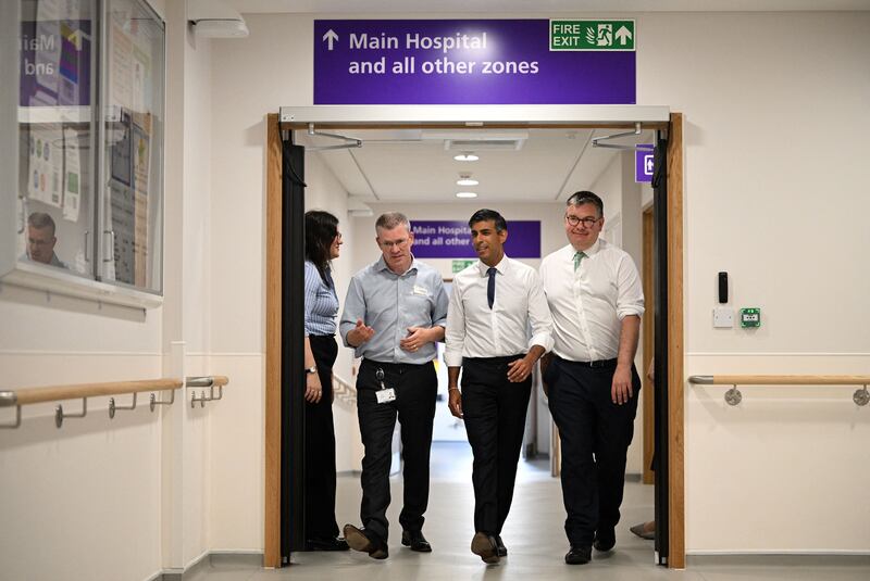 UK prime minister Rishi Sunak speaks to staff during a visit to Milton Keynes University Hospital. Photograph: Leon Neal/Pool/AFP via Getty