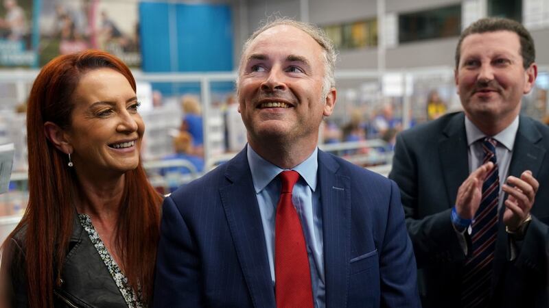 Independent candidate Alex Easton (centre) after he was elected at Ulster University Jordanstown count centre in Newtownabbey. Photograph: Brian Lawless/PA Wire