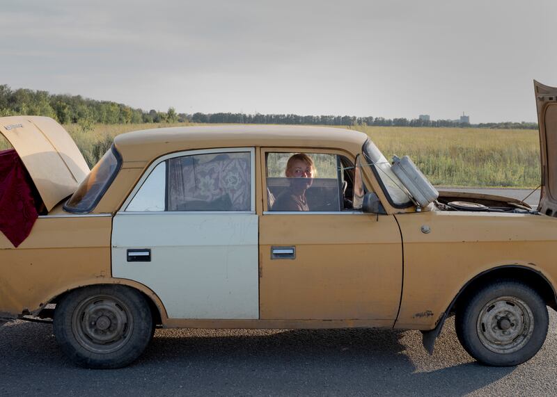 A woman after fleeing Siversk with her partner outside Kharkiv, Ukraine. Photograph: Emile Ducke/The New York Times