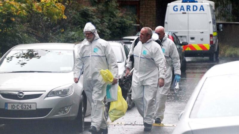 State pathologist Michael Curtis arrives at Ridge Hall where the body of a boy was discovered. Photograph: Stephen Collins/Collins Photos