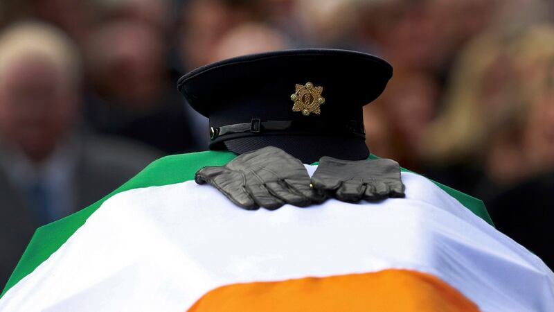 The remains of murdered garda Anthony Golden are carried into St Oliver Plunkett Church, Blackrock near  Dundalk. Photograph: Cathal McNaughton/Reuters