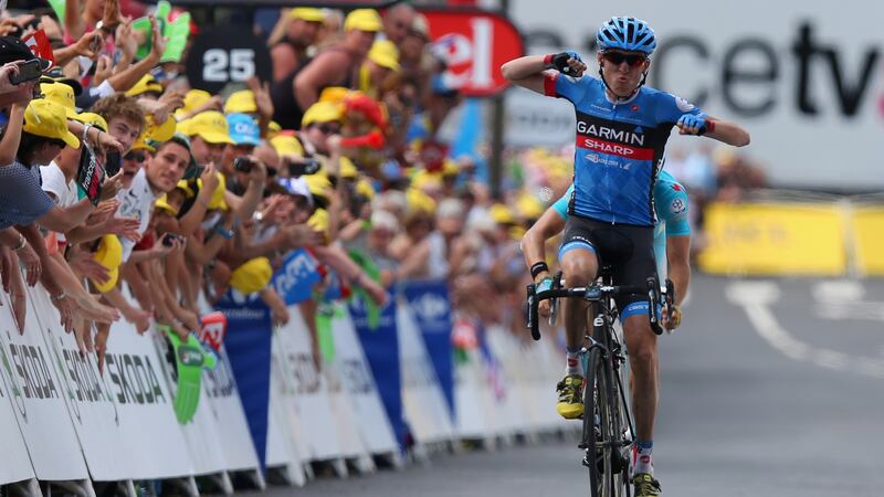 Dan Martin celebrates winning the ninth stage of the 2013 Tour de France in   2013. Photo:  Bryn Lennon/Getty Images