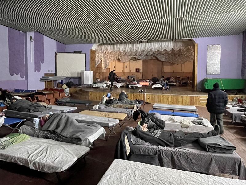 A concert hall in a cultural centre in Pavlohrad, eastern Ukraine, now serves as a shelter for people displaced by Russia's invasion. Photograph: Daniel McLaughlin