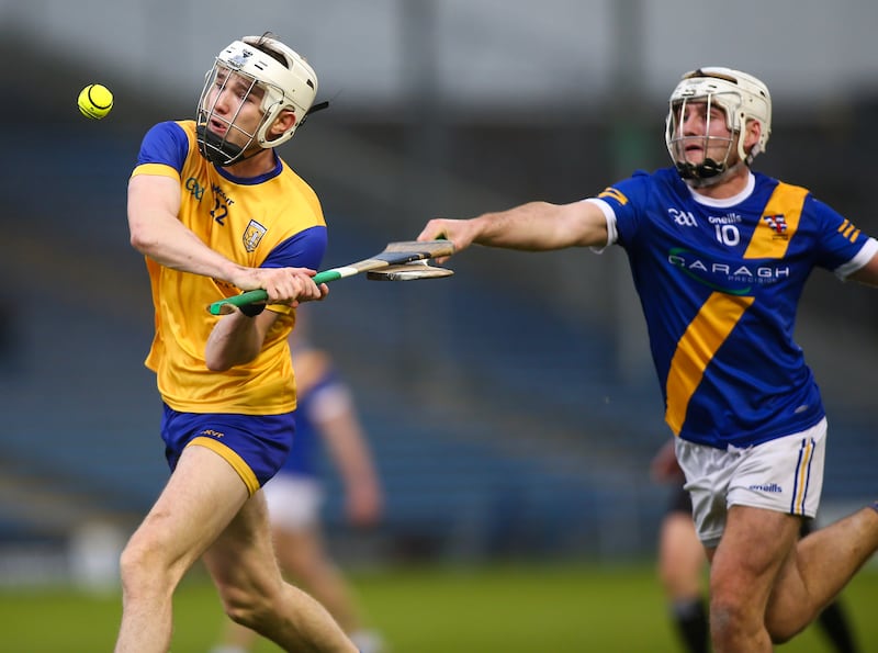 Na Fianna's Jack Meagher is hooked by Loughrea's Caimin Killeen. Photograph: Ken Sutton/Inpho