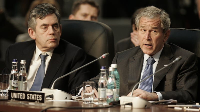 British prime minister Gordon Brown listens to US president George W Bush, during at Nato summit conference in Bucharest in 2008. File photograph: Michel Euler/AP Photo