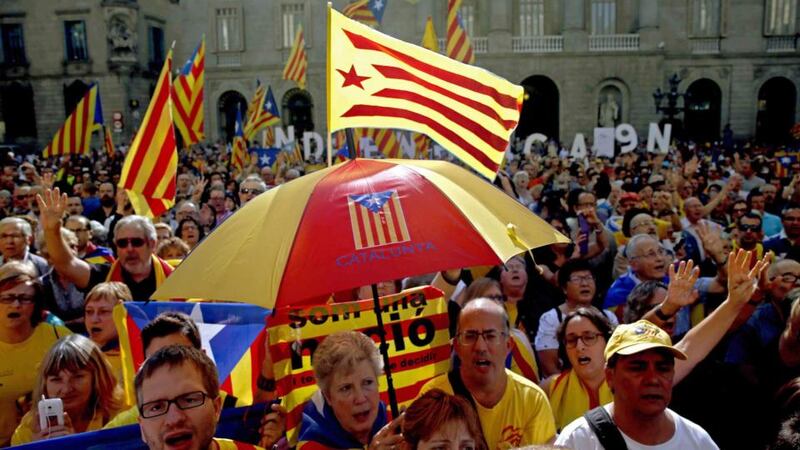 People gather at the regional government headquarters in support of the referendum for independence at Sant Jaume square in Barcelona today. Photograph: EPA