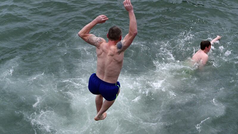 The scene at Sandycove Forty Foot as people gathered for the Christmas Swim.Photograph: Cyril Byrne/The Irish Times