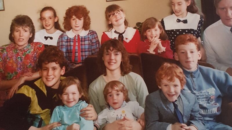 O’Reilly family: (back row) Sheila, Maeve, Mairead, Dearbhaile, Caoimhe, Orla, Joe; front: Dara holding Fionnuala, Sinead holding Conall, Séamas, Shane