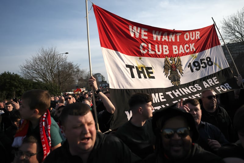 Manchester United fans protest ahead of Sunday's Premier League game against Arsenal at Old Trafford. Photograph: Carl Recine/Getty Images