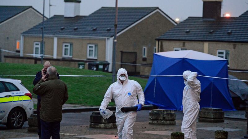 Forensic Garda at the scene of the shooting at Bridgeview halting site off Cloverhill Road on Saturday evening. Photograph: Cyril Byrne/The Irish Times