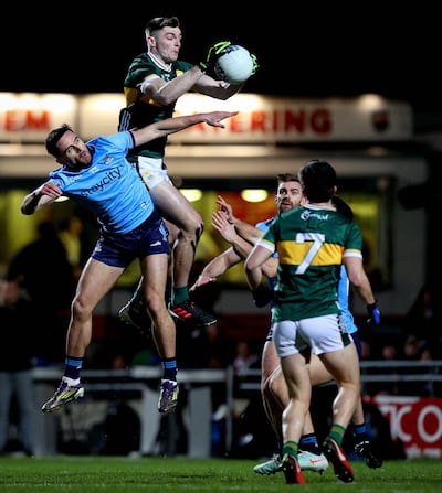 Kerry’s Diarmuid O'Connor and Niall Scully of Dublin compete for possession. Photograph: Ryan Byrne/Inpho 