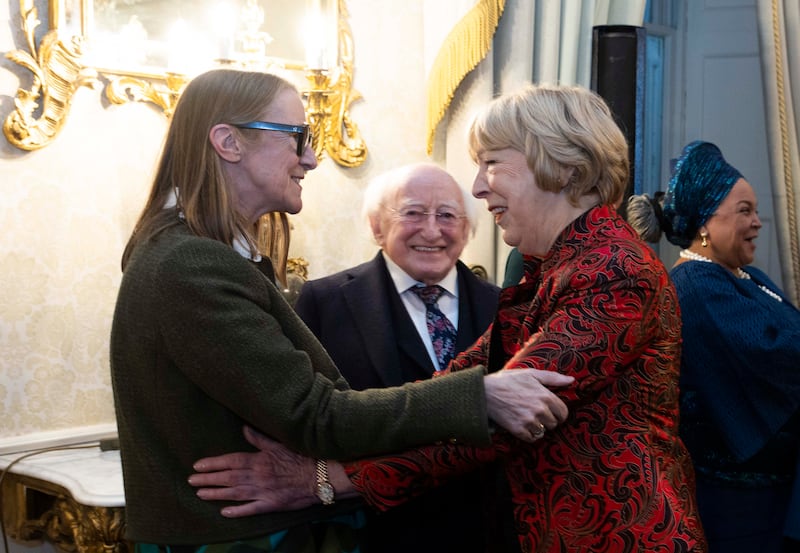 President Michael D Higgins and his wife, Sabina, greet Orla Kiely, who was awarded the Presidential Distinguished Service Award. Photograph: Sam Boal/Collins 