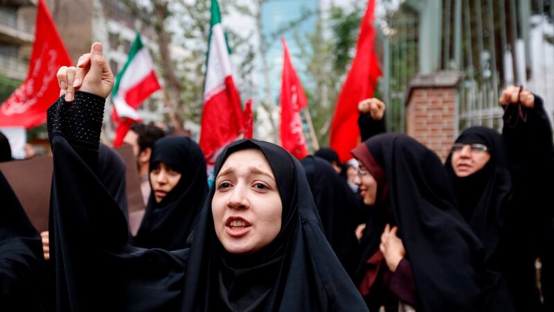 Iranian women chant slogans during an anti-US demonstration outside the former US embassy headquarters in  Tehran on Wednesday. Photograph: Atta Kenare/AFP/Getty Images