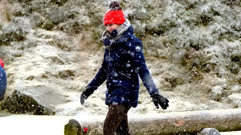 Walking at the Wicklow Gap mountain pass in Co Wicklow. Photograph: Niall Carson/PA Wire