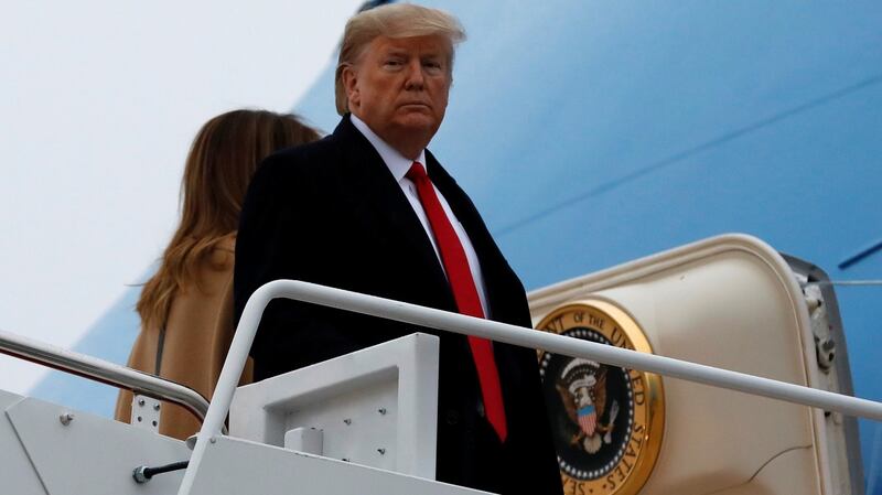 US president Donald Trump and first lady Melania Trump board Air Force One in Maryland. Photograph: Yuri Gripas/Reuters