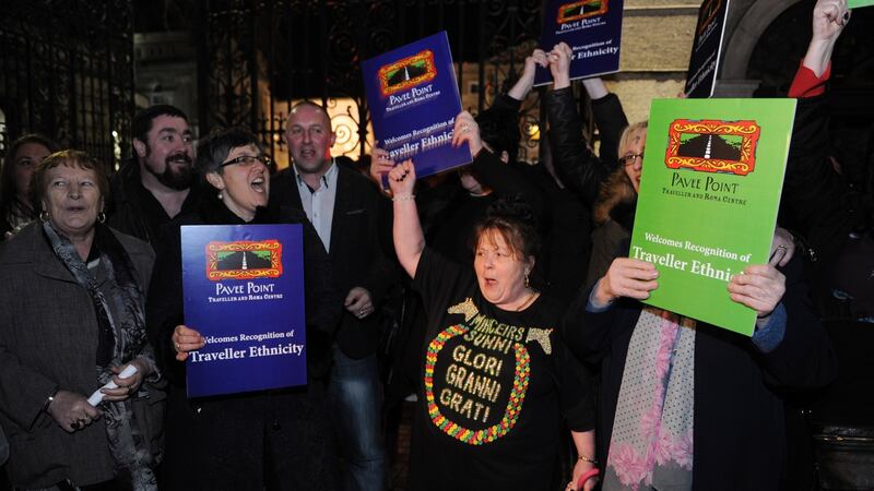 Travellers celebrate outside the Dáil after the debate on recognition of Traveller ethnicity. Photograph: Aidan Crawley