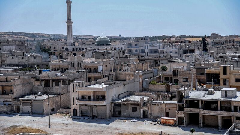 Damaged buildings in Khan Sheikhoun city. Photograph: Syrian Arab News Agency