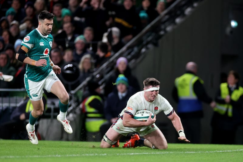 Tom Curry of England scores a try, England score two late tries to put a respectable face on the scoreline but still fall to a 27-22 defeat. Photograph: David Rogers/Getty