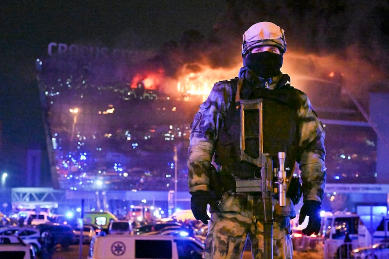 A Russian Rosguardia (National Guard) serviceman secures an area near the Crocus City Hall (Dmitry Serebryakov/AP)