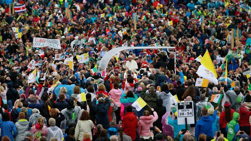 Pope Francis in the popemobile moving through the crowd in the Park. Photo Nick Bradshaw for The Irish Times