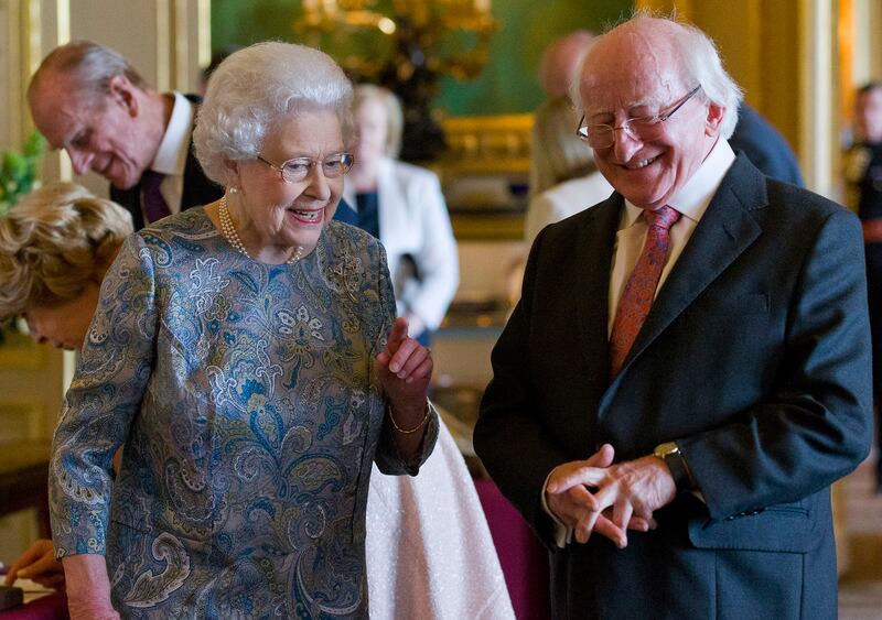 The queen of the Britons with a wizard named Michael D Higgins. Photograph: Justin Tallis/Pool/Getty