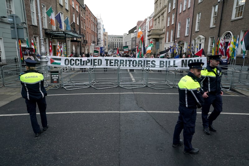 Drama inside Leinster House aside, pro-Palestinian protesters gathered outside calling for incoming Government to pass the Occupied Territories Bill. Photograph: Brian Lawless/PA Wire