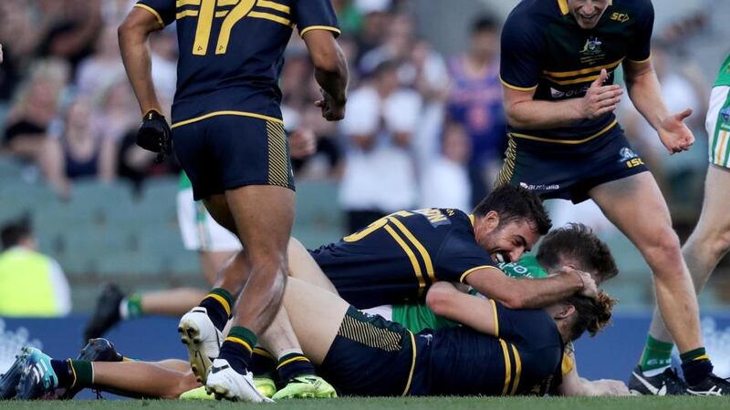 Kade Simpson celebrates with Nat Fyfe after he makes a tackle. Photograph: Tommy Dickson/Inpho