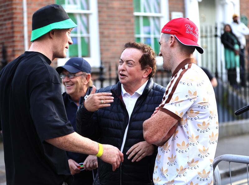 Limerick players William O'Donoghue and Darragh O'Donovan chat to RTÉ broadcaster Marty Morrissey at the team's homecoming celebration. Photograph: Tom Maher/Inpho