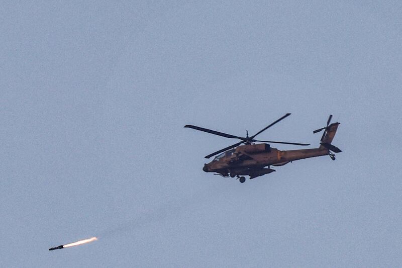 An Israeli air force attack helicopter fires a missile while flying in an area along the border with the Gaza Strip and southern Israel on December 14th. Photograph: Jack Guez/AFP via Getty