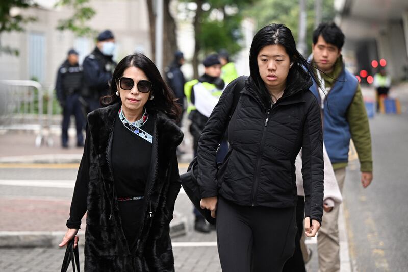 Teresa Lai, wife of media tycoon Jimmy Lai, daughter Claire Lai and son Lai Shun Yan arriving at West Kowloon Court in Hong Kong on December 22nd, 2023. Photograph: Peter Parks/AFP via Getty Images