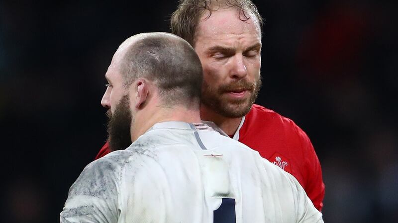 England’s Joe Marler and Alun Wyn Jones of Wales after the game at Twickenham. Photograph: James Crombie/Inpho